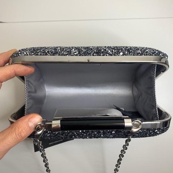 Black, silver glitter clutch. Chain can be easily removed. Hard shell. - Picture 3 of 3